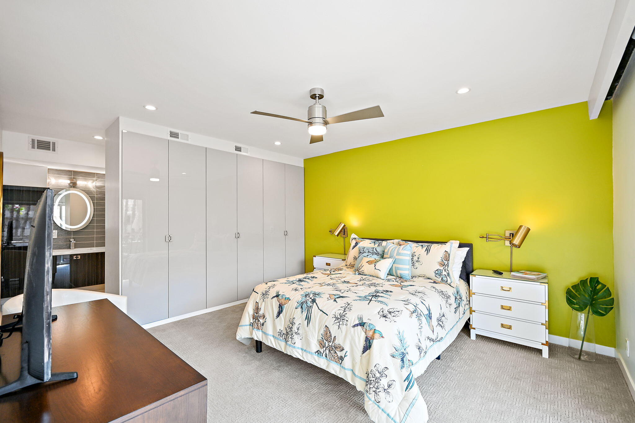 277 East Alejo Road, Unit 215 Palm Springs, CA 92262 - Photo 33 of 52 a bedroom with a bed and a table