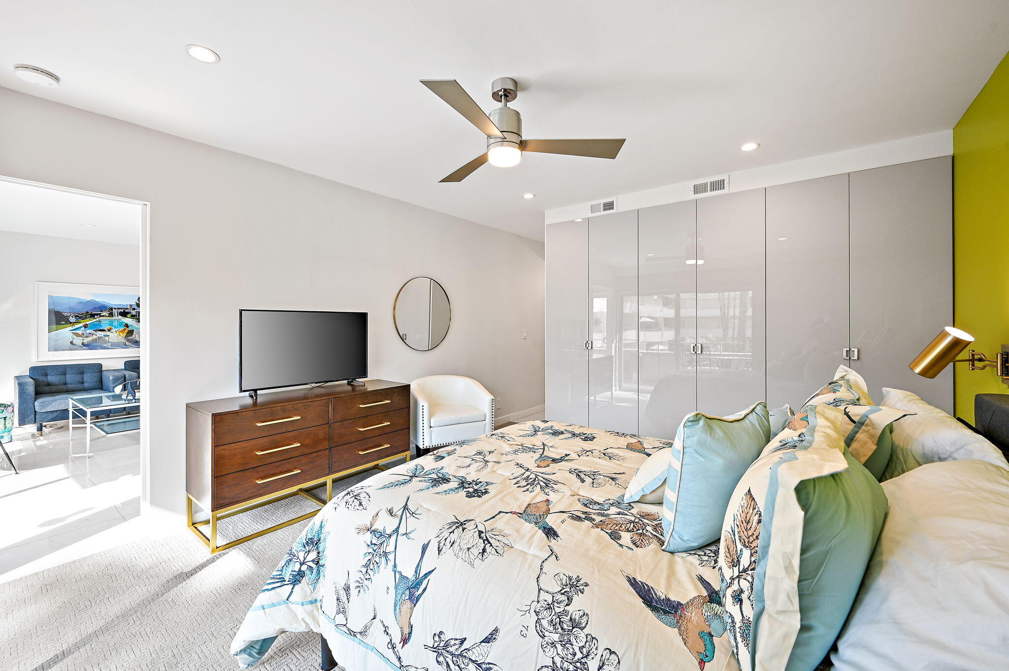 277 East Alejo Road, Unit 215 Palm Springs, CA 92262 - Photo 35 of 52 a bedroom with a bed and a television