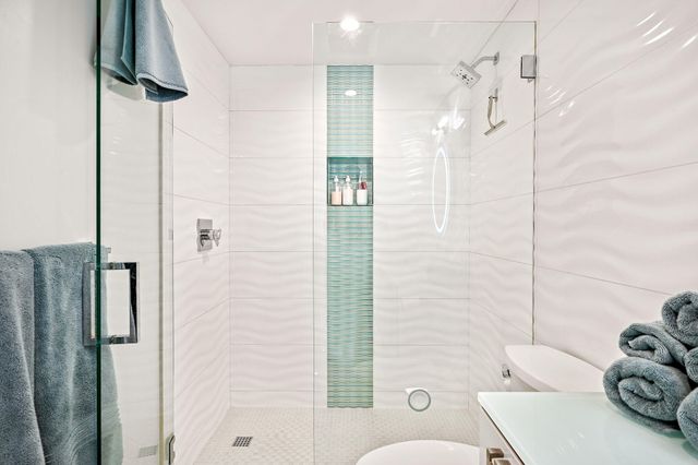 a view of a backyard with palm trees