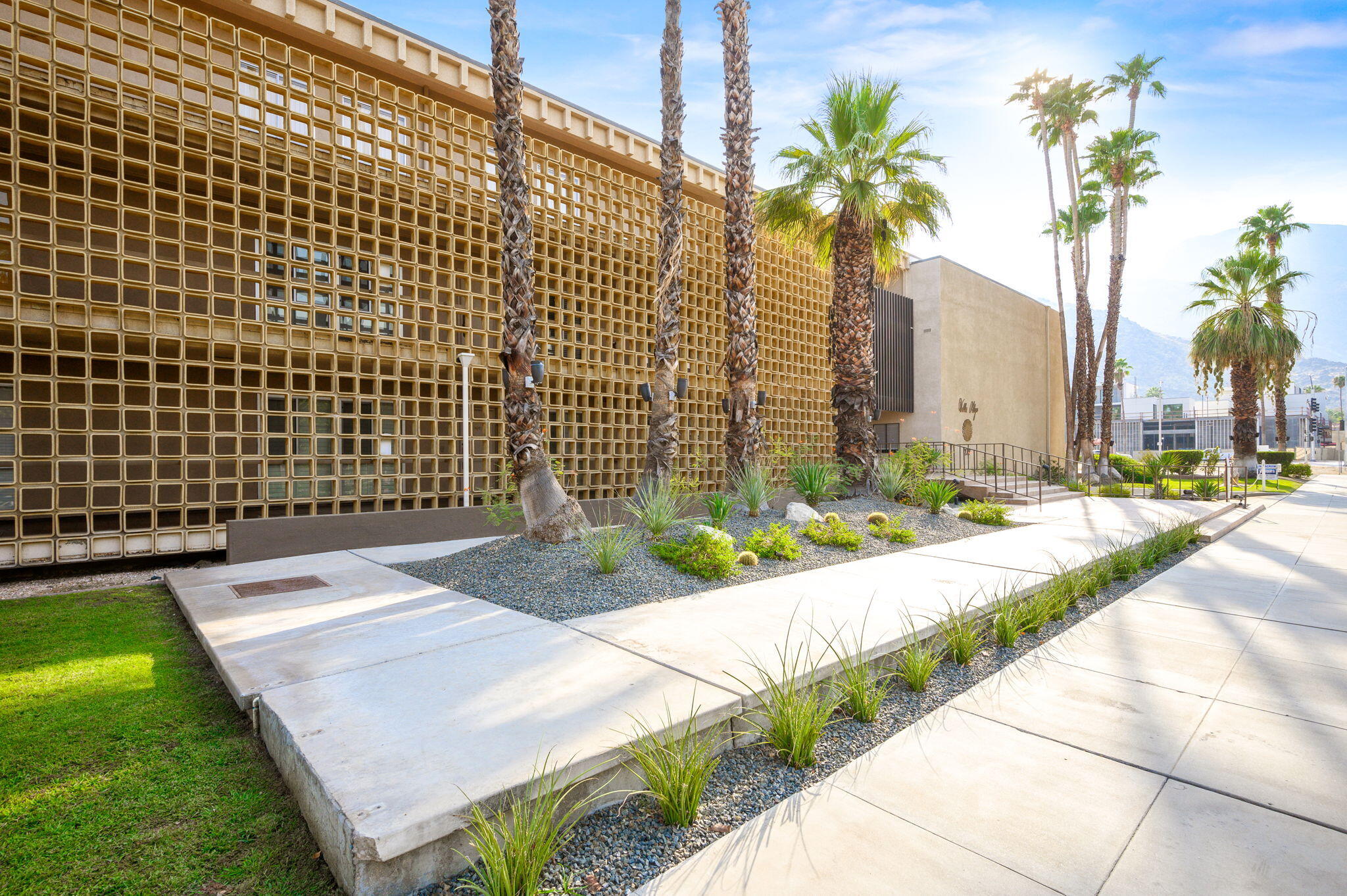 277 East Alejo Road, Unit 215 Palm Springs, CA 92262 - Photo 50 of 52 a view of a backyard with palm trees