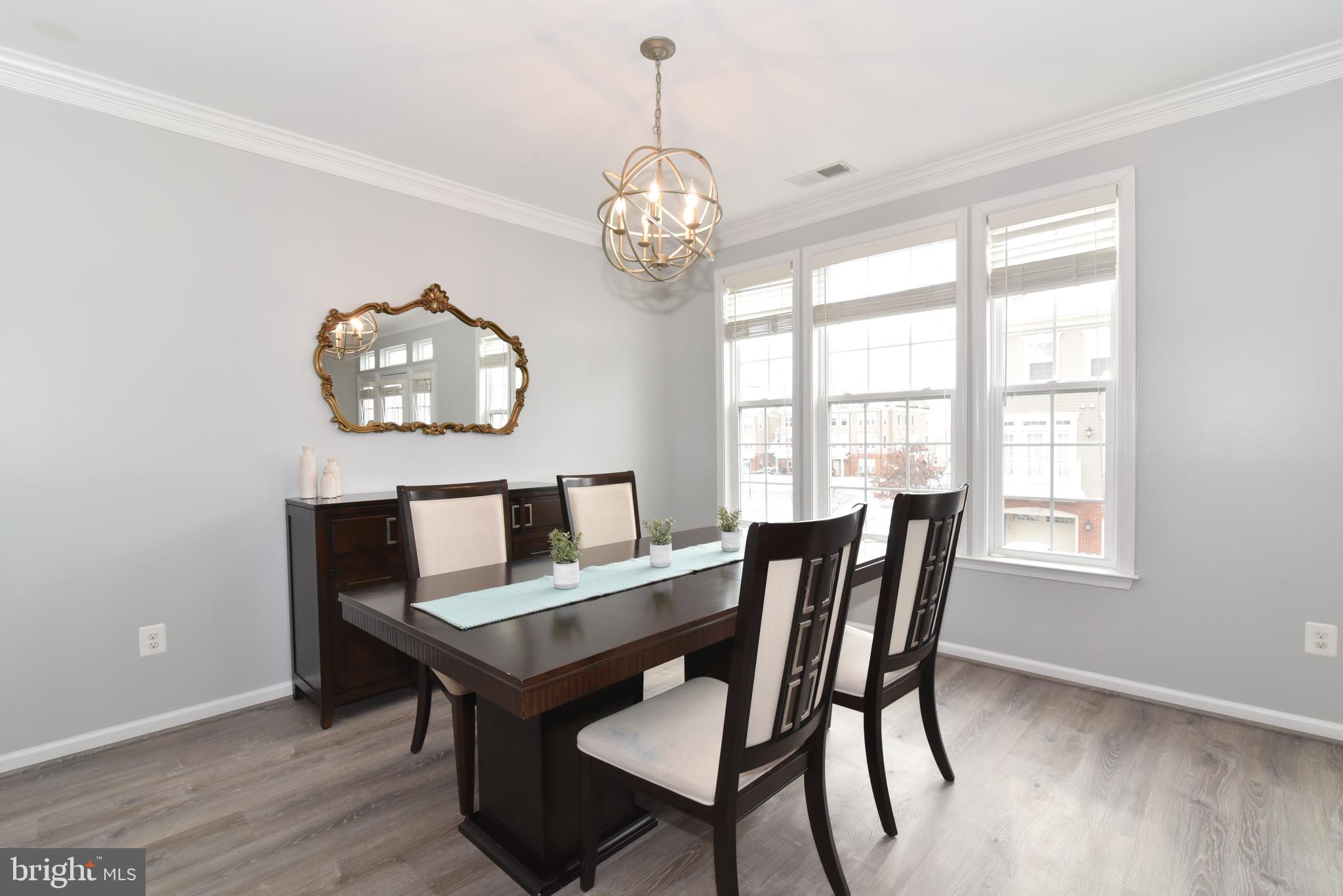 42594 Sunset Ridge Square, Unit 42594 Ashburn, VA 20148 - Photo 6 of 41 Large dining room with great light