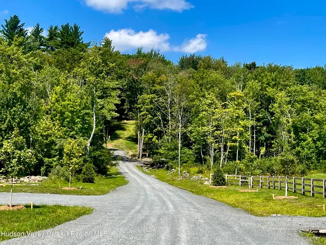 a view of a house with a big yard