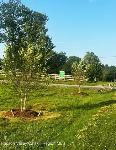 a view of a golf course with a lake