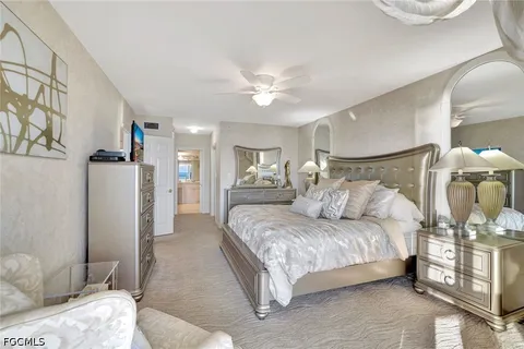 a bathroom with a sink a tub and a mirror