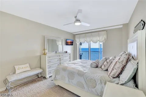 a bathroom with a double vanity sink mirror and toilet