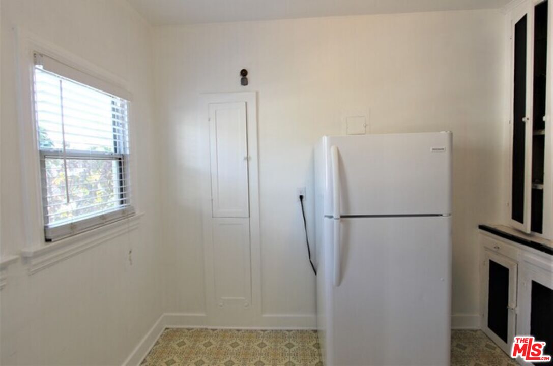 6656 Vista Del Mar, Unit A Playa del Rey, CA 90293 - Photo 12 of 16 a white refrigerator freezer and a window