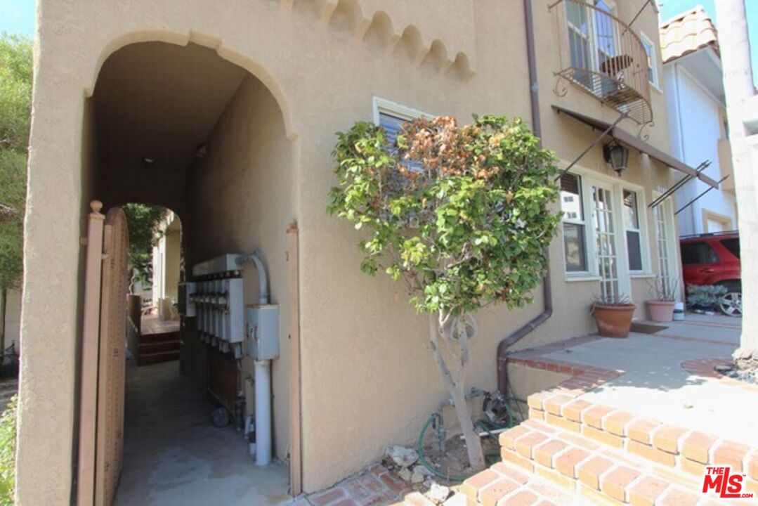 6656 Vista Del Mar, Unit A Playa del Rey, CA 90293 - Photo 14 of 16 a view of a house with a potted plant