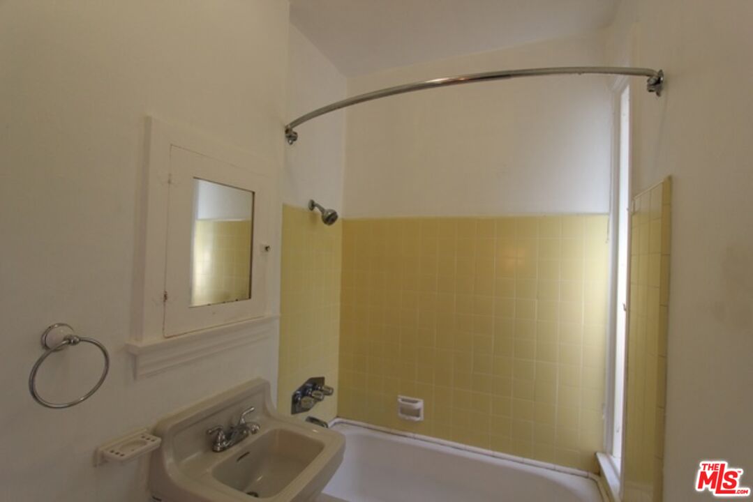 6656 Vista Del Mar, Unit A Playa del Rey, CA 90293 - Photo 8 of 16 a bathroom with a sink and a mirror