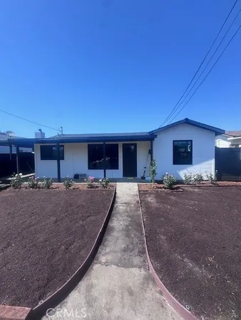 a view of a house with a entertaining space