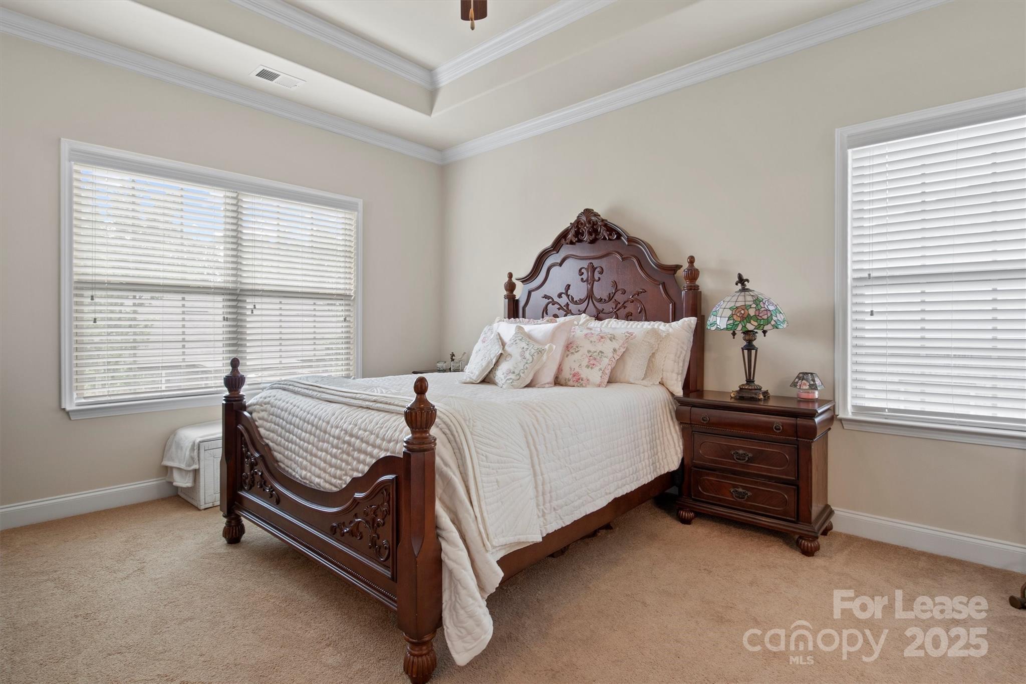 7266 Kenyon Drive Denver, NC 28037 - Photo 14 of 25 a bedroom with a bed and a window