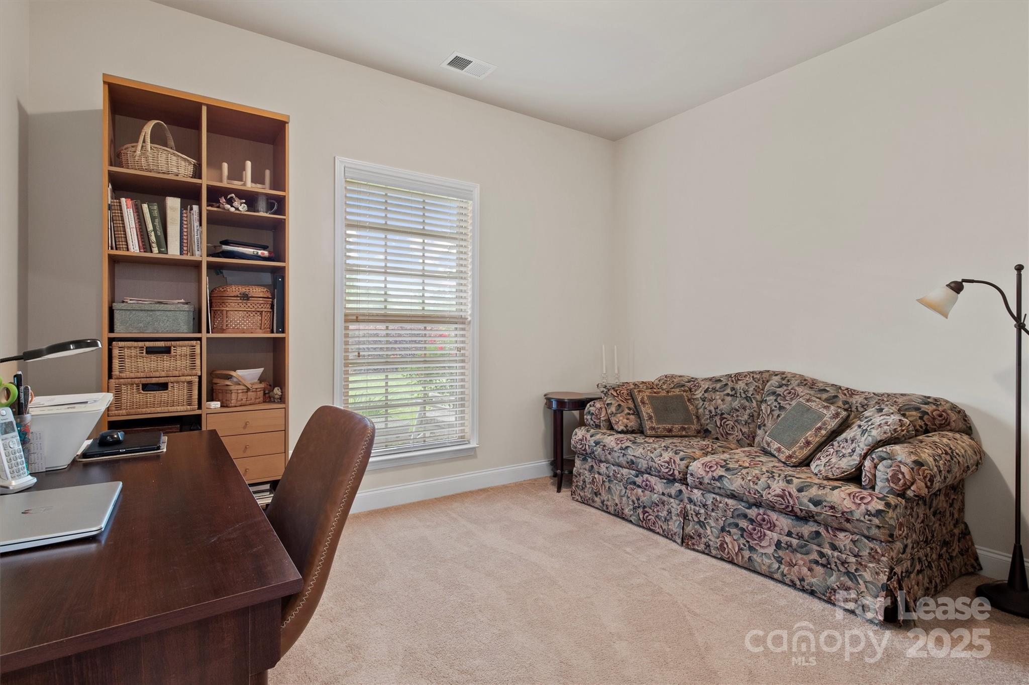 7266 Kenyon Drive Denver, NC 28037 - Photo 20 of 25 a living room with furniture and a window