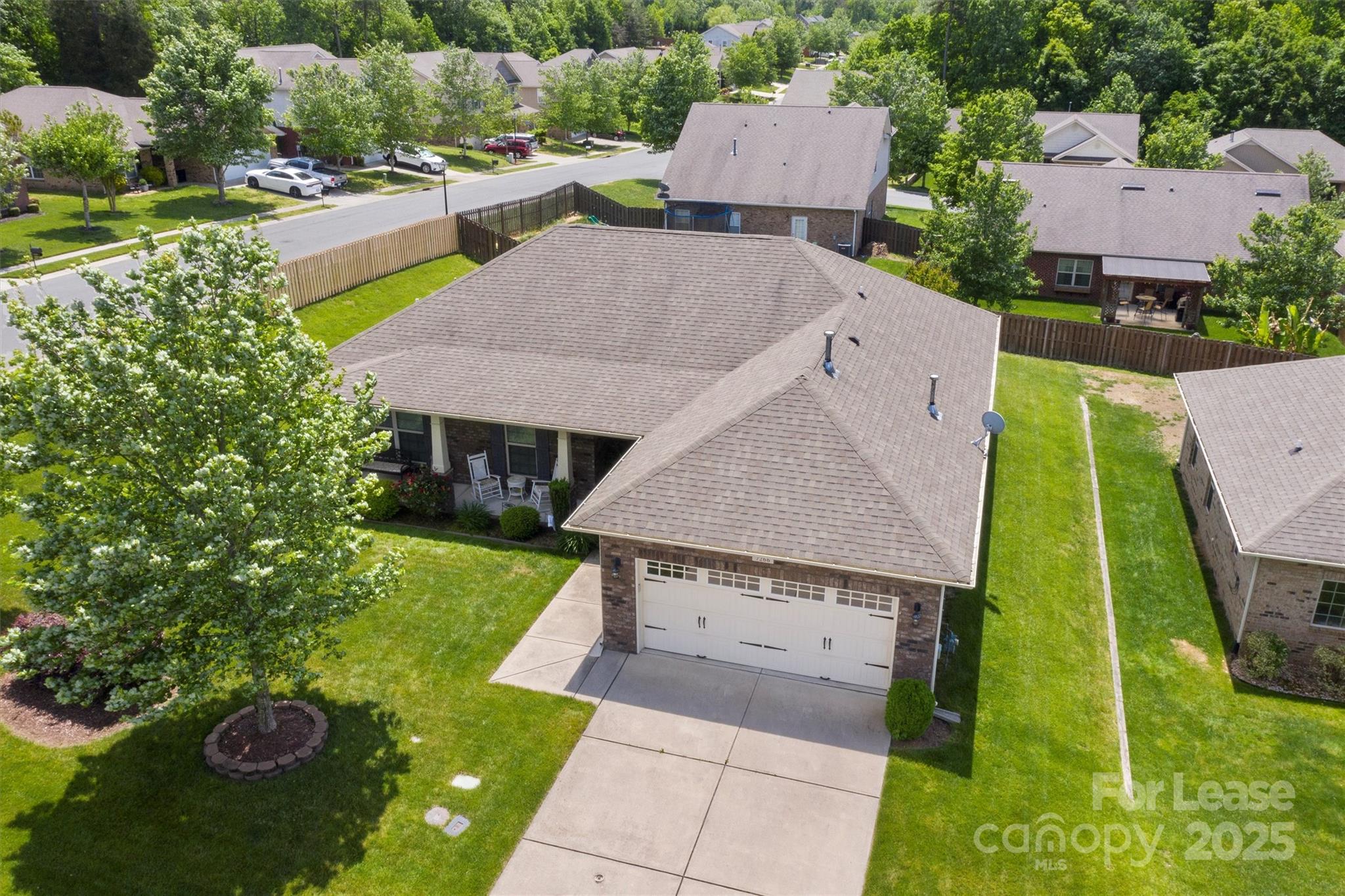 7266 Kenyon Drive Denver, NC 28037 - Photo 3 of 25 an aerial view of a house with swimming pool garden and patio