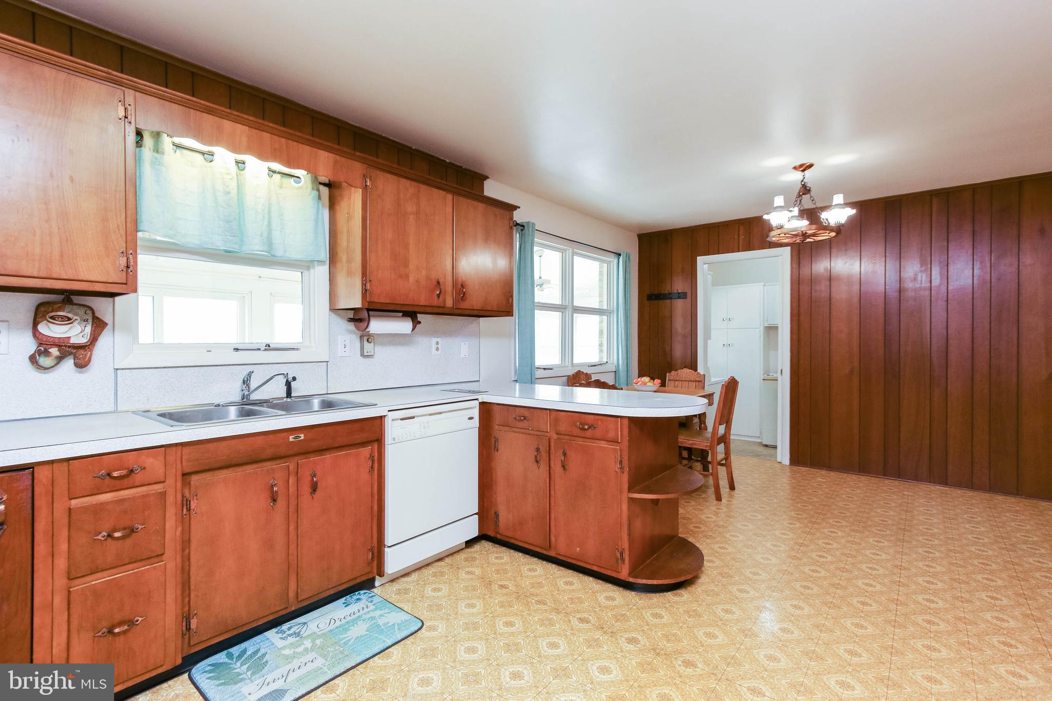 5004 Old Quarter Road Upperco, MD 21155 - Photo 13 of 61 a kitchen with granite countertop a sink cabinets and window