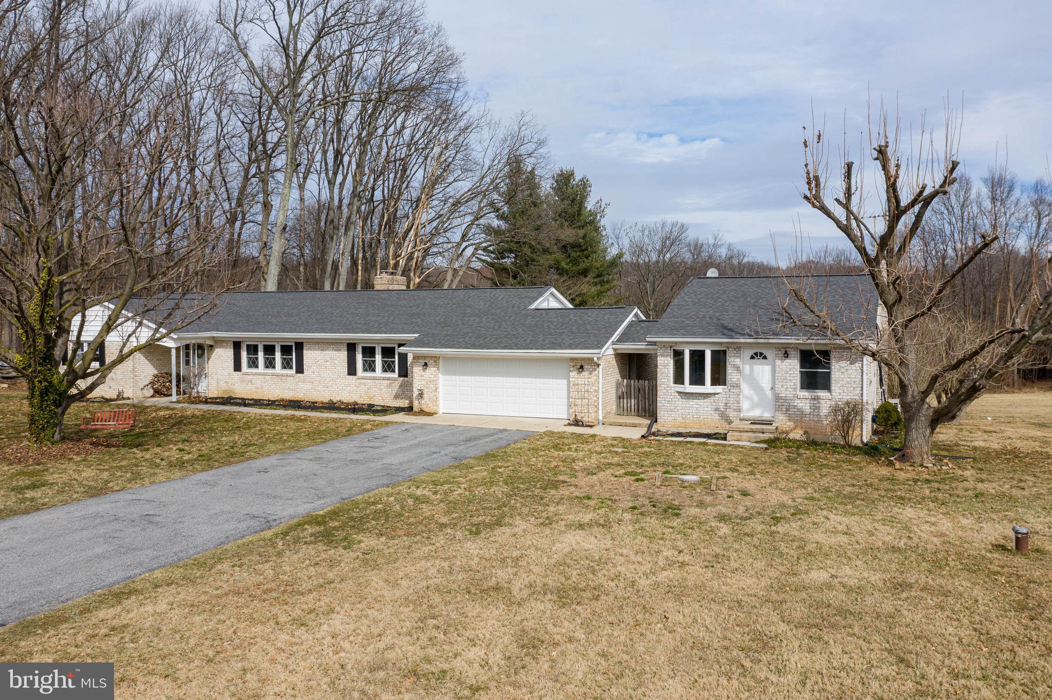 5004 Old Quarter Road Upperco, MD 21155 - Photo 3 of 61 front view of a house with a yard