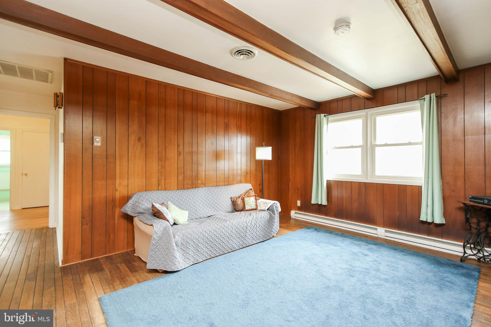 5004 Old Quarter Road Upperco, MD 21155 - Photo 21 of 61 a living room with furniture and a window