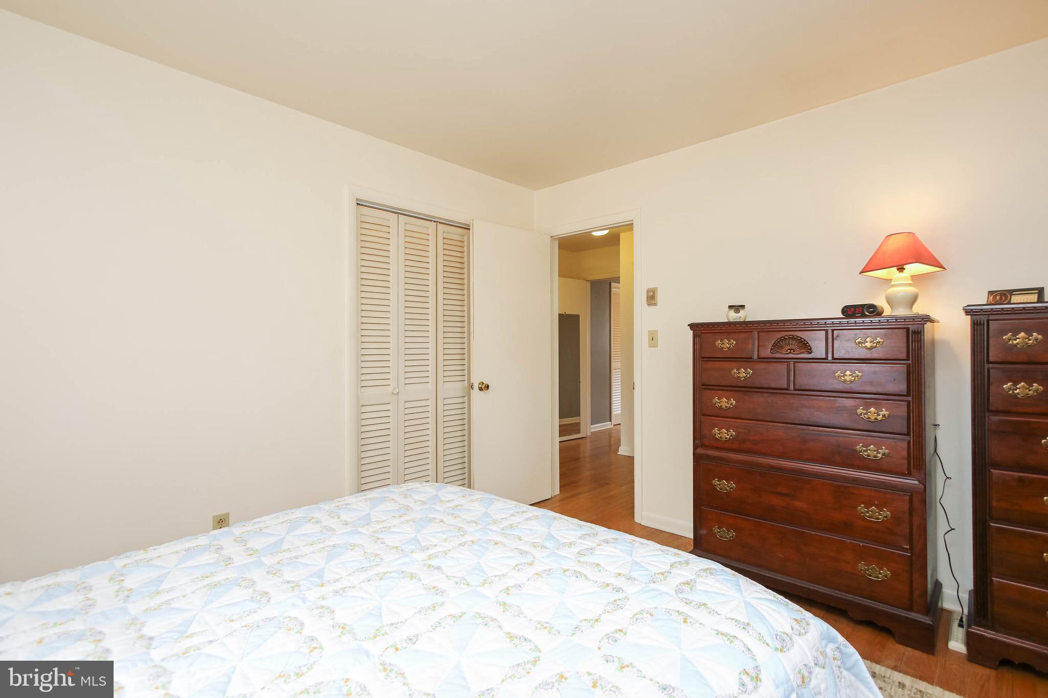 5004 Old Quarter Road Upperco, MD 21155 - Photo 27 of 61 a bedroom with a bed and a dresser