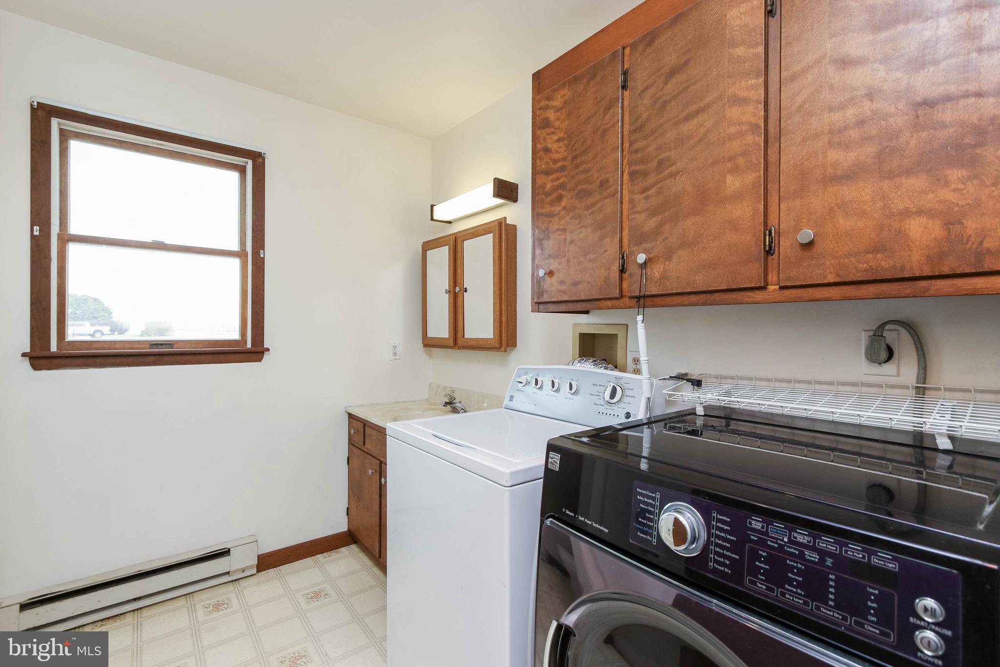 5004 Old Quarter Road Upperco, MD 21155 - Photo 41 of 61 a utility room with dryer and washer