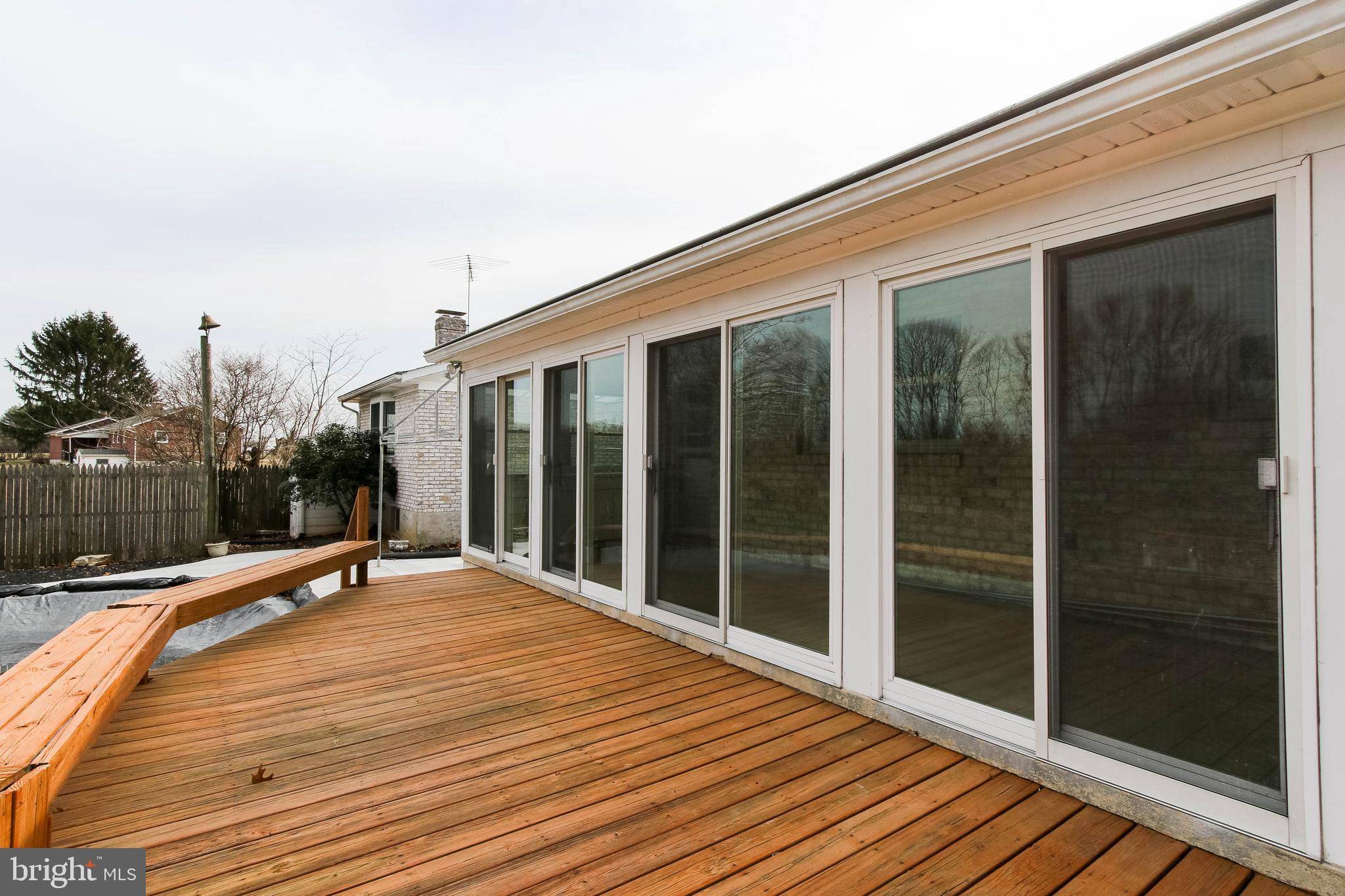 5004 Old Quarter Road Upperco, MD 21155 - Photo 50 of 61 a backyard of a house with wooden floor and fence