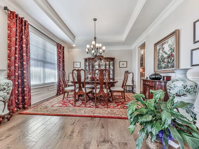 a living room with fireplace furniture and a flat screen tv