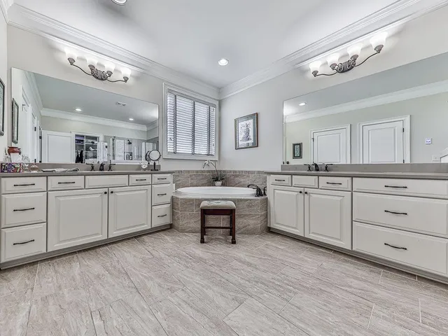 a bed room with a bed and a window