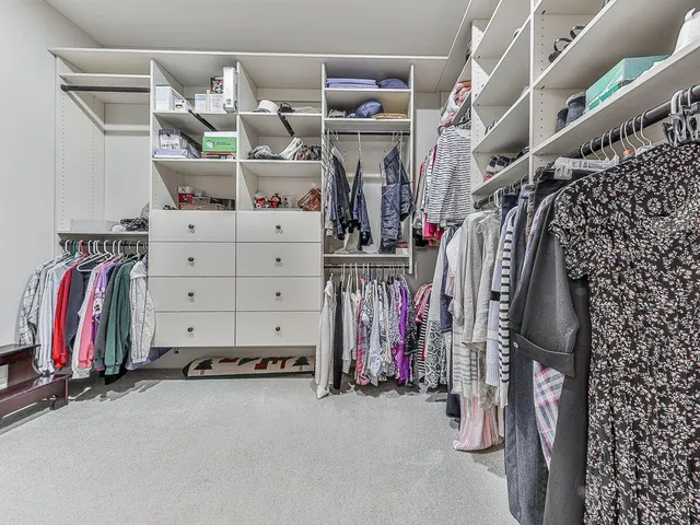 a open kitchen with a table and chairs in it