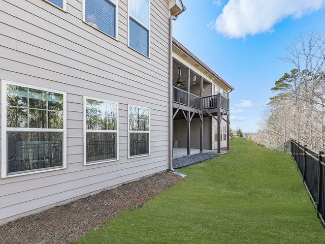 an aerial view of house with yard