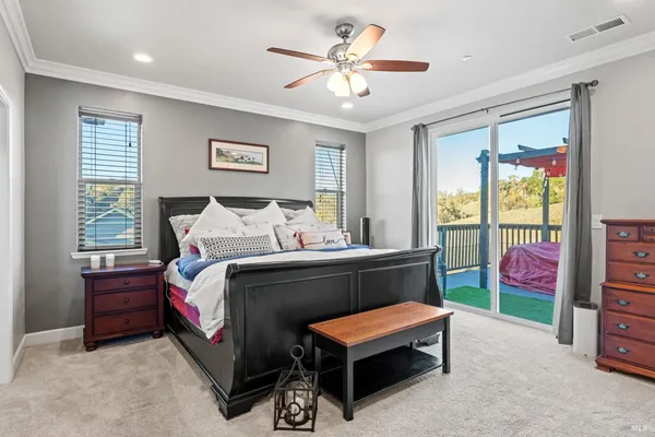 a bedroom with bed and a window