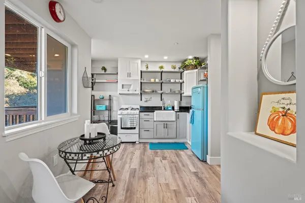 a living room with furniture and a table