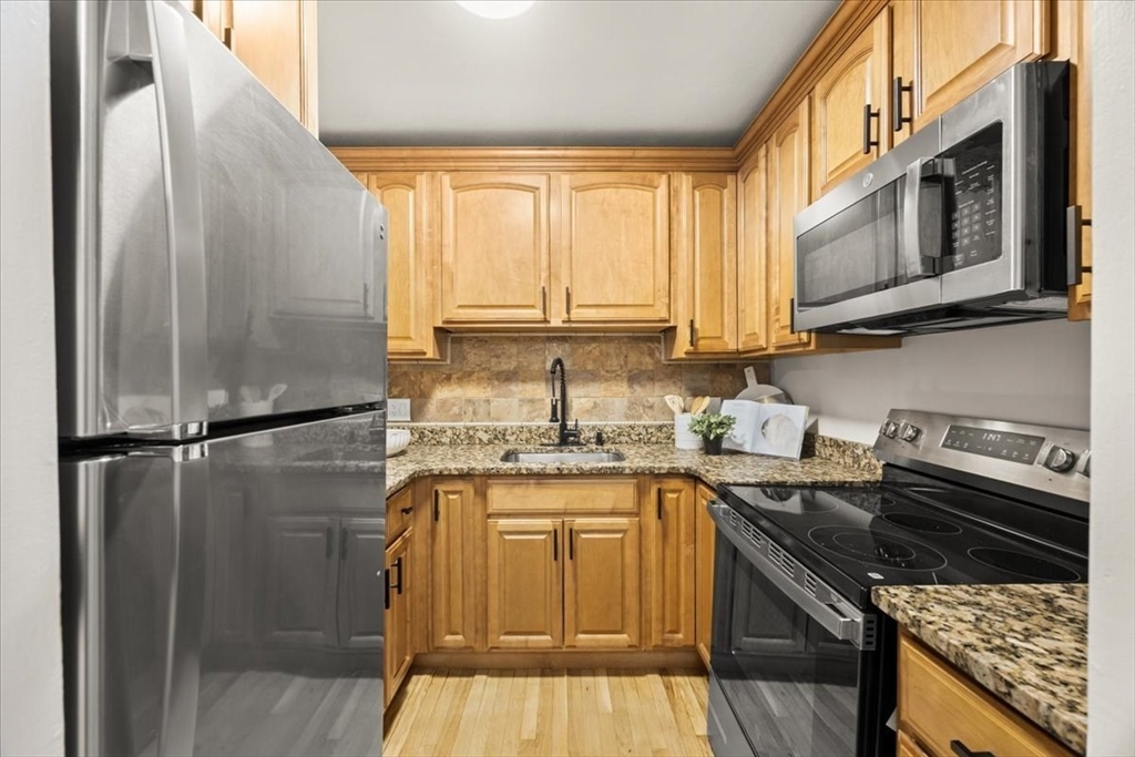 115 Grove Street, Unit 1 Boston, MA 02132 - Photo 1 of 32