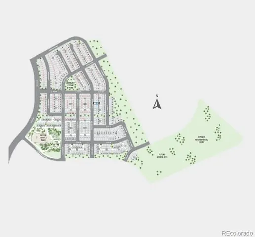 a white building with a clock tower in front of it