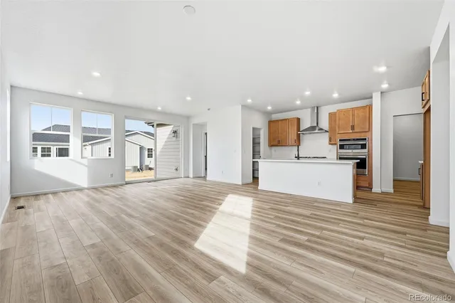 a view of a kitchen with a sink and cabinets