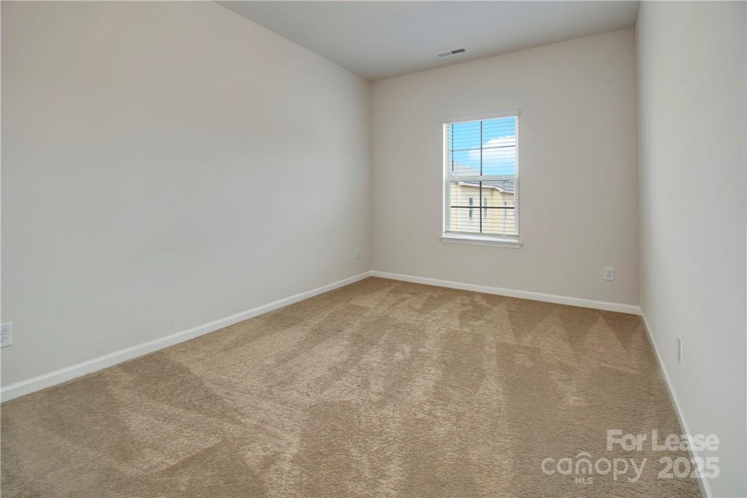3130 Glenn Hope Way Matthews, NC 28104 - Photo 17 of 24 an empty room with a window