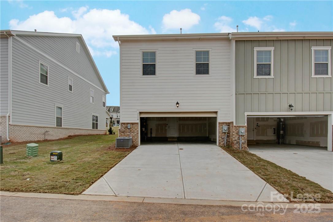 3130 Glenn Hope Way Matthews, NC 28104 - Photo 24 of 24 a front view of a house with garden