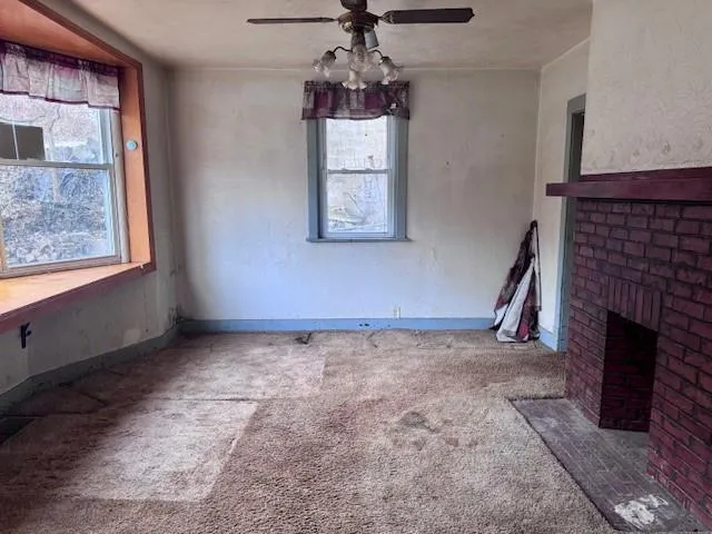 a view of an empty room with window