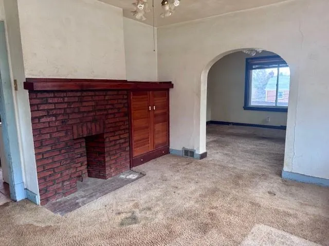 an empty room with windows