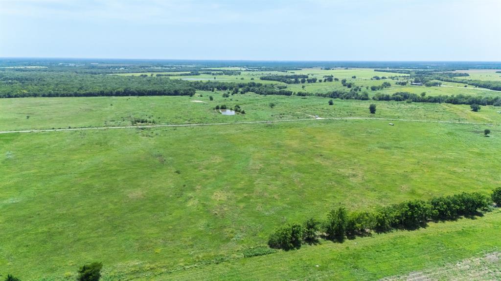Lot 9 County Line Road Pecan Gap, TX 75469 - Photo 5 of 10 a view of an outdoor space with a lake view