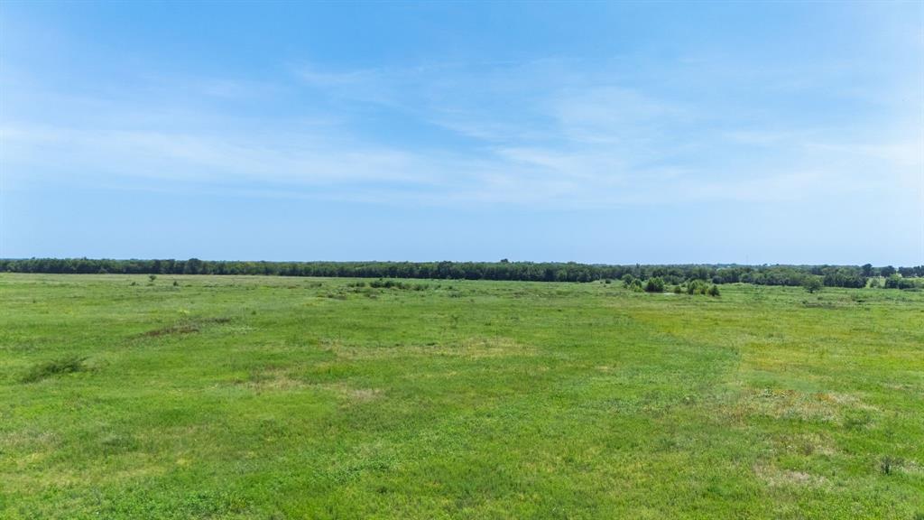 Lot 9 County Line Road Pecan Gap, TX 75469 - Photo 7 of 10 a view of an ocean and yard