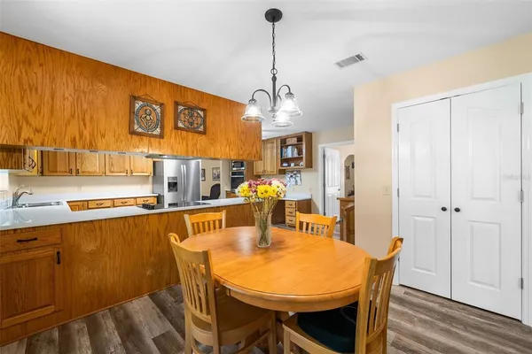 a view of a dining room with furniture