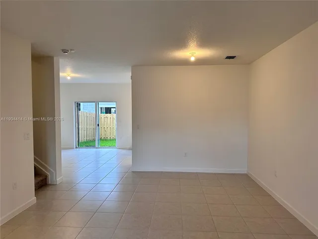 a view of hallway with livingroom