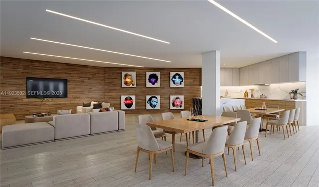 a dining room with furniture and wooden floor