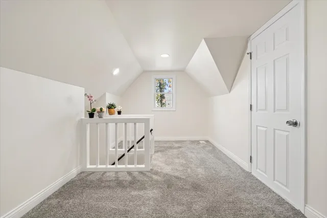 a view of a hallway with staircase