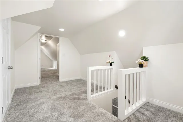 a view of a hallway with staircase