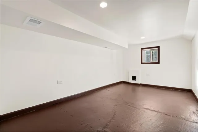 an empty room with a workbench