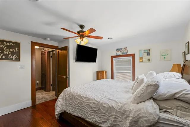 a bedroom with furniture and a window