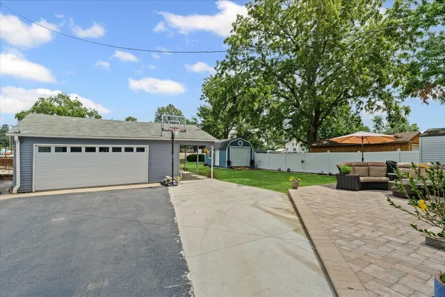 a view of a house with a back yard