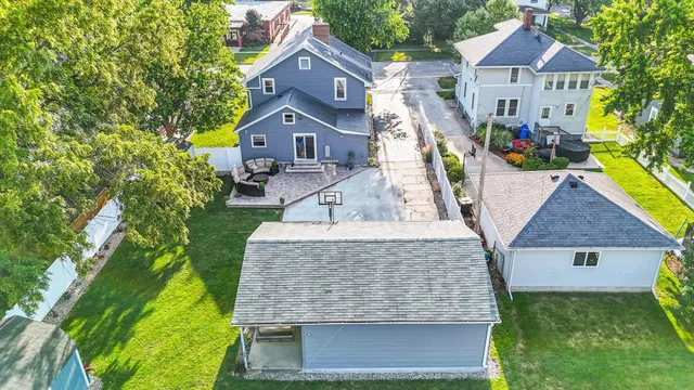 a view of entryway livingroom and hall with wooden floor