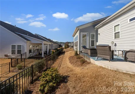a view of a house with snow in the yard