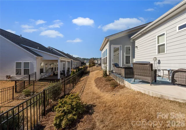 a view of a house with snow in the yard