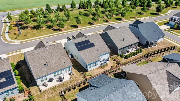 an aerial view of a house with a garden