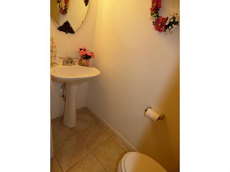 121 Park Place McKees Rocks, PA 15136 - Photo 14 of 23 Partial Bath. First floor powder room has ceramic towel.